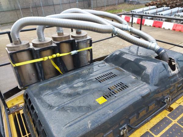 Carousel 2 - exhaust fume diesel filter kits attached to the top of plant machinery_