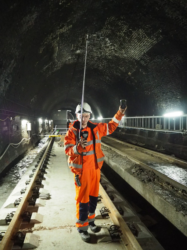 Carousel 2 - site operative in PPE using an RVT Group gas monitor to check air quality levels in real-time 1