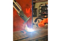 Close-up-of-welding-in-action-and-RAVEX-Mobile-Welding-Fume-Station-arm-extracting-fumes-to-the-left
