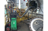 RAVEX Portable Welding Fume Filtration Unit with lots of wires and pipework leading into a oil refinery porthole