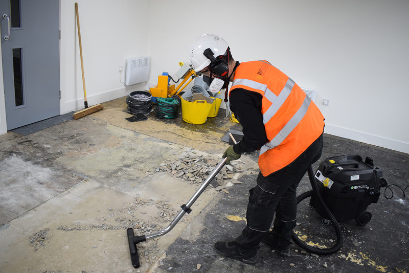 Carousel 3 - M Class Vacuum with a floor bar in use collecting dust and debris 1