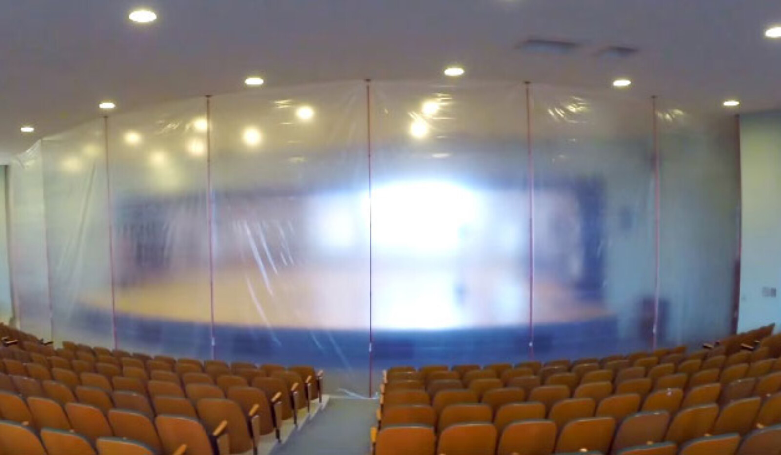 Dustex Quick props separating a stage and seating area to contain a potentially dusty work area