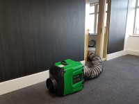 Dustex Raptor ready for dust extraction in an office environment