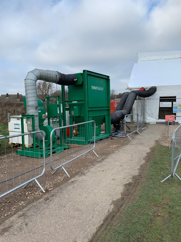 Main image - Powerful abrasive blasting extraction hire solution in use to capture dust at the source