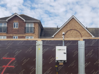 Monitex Area Dust Monitor on a fence located between a live project and neighbouring communities