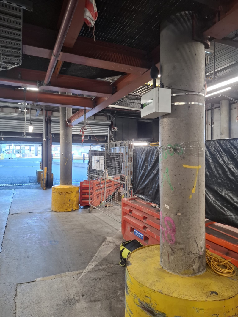 RVT site monitor mounted on a column in a basement under construction