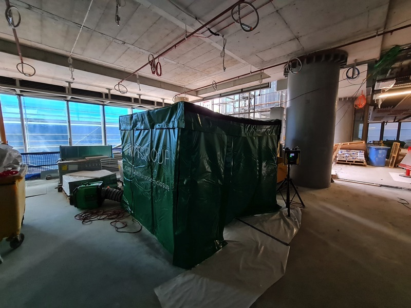 Dust containment enclosure set up on an office floor under refurbishment