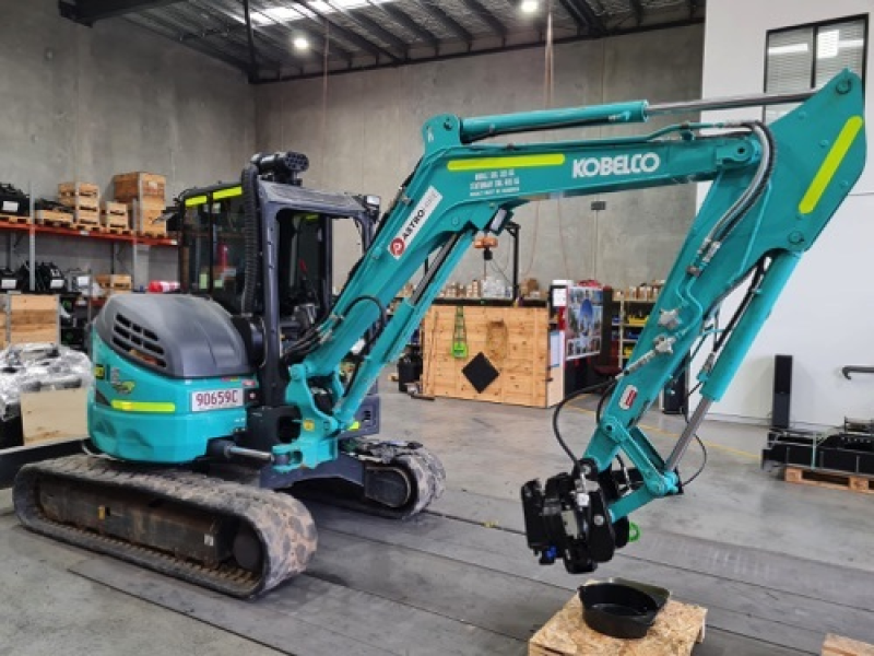 Kobelco mini excavator fitted with cabin filtration in a workshop