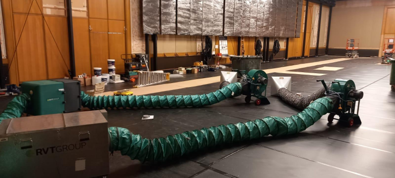 RVT extraction fans and green ducting laid out across a gallery floor
