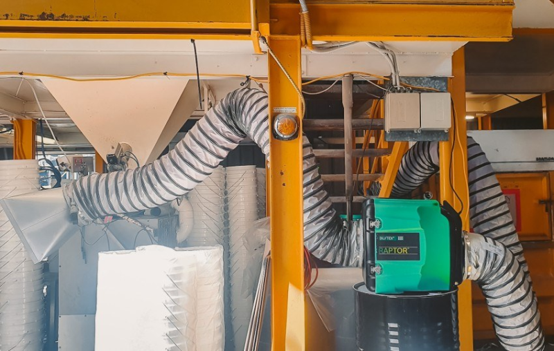 RVT Raptor dust filtration unit and ducting inside a manufacturing plant