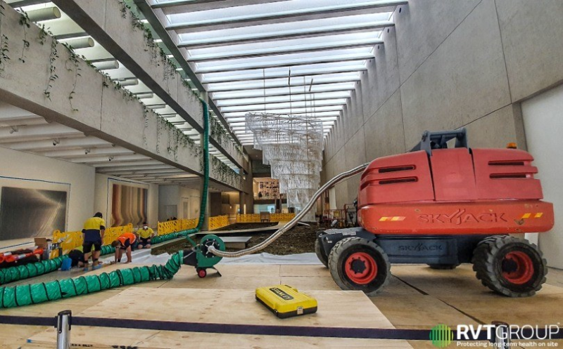 Boom lift and green extraction ducting inside a gallery under works
