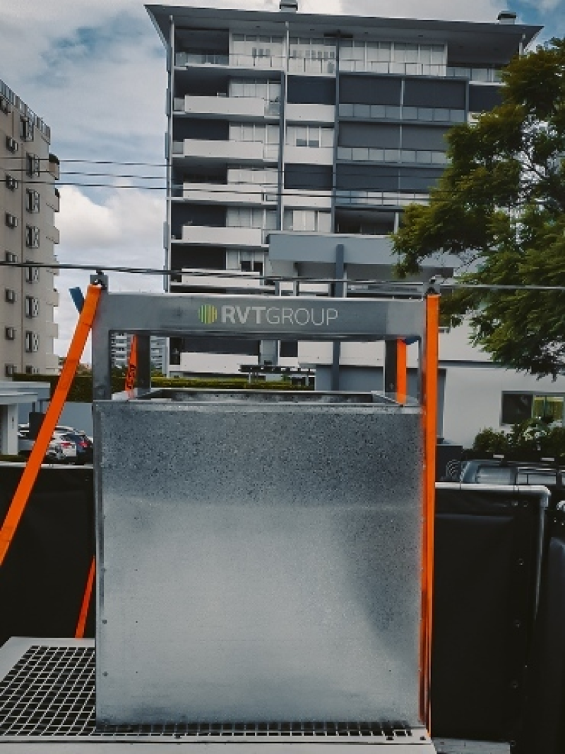 RVT acoustic attenuator installed on site in front of an apartment building